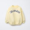 سویشرت با طرح شعار و گل بابونه برند Zara