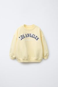 سویشرت با طرح شعار و گل بابونه برند Zara